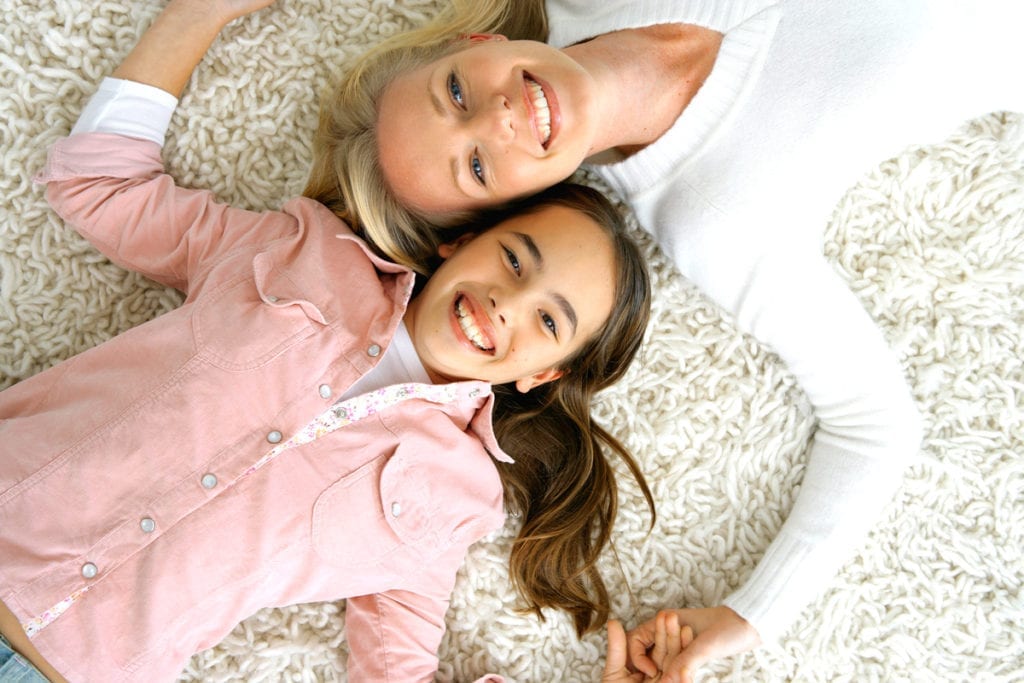 Mother-and-daughter-lying-on-floor